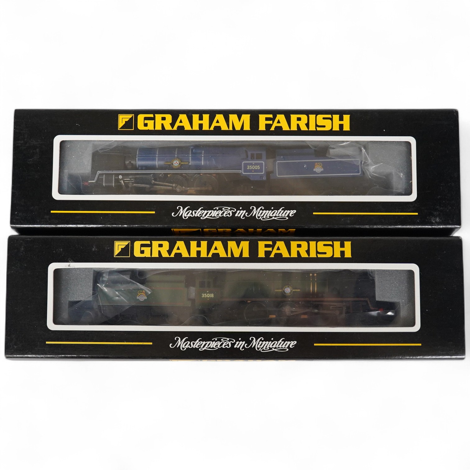 Two boxed Graham Farish N gauge railway BR Merchant Navy Class locomotives; British India Line 35018 (372-300) and Canadian Pacific 35005 (372-301). Condition - good.